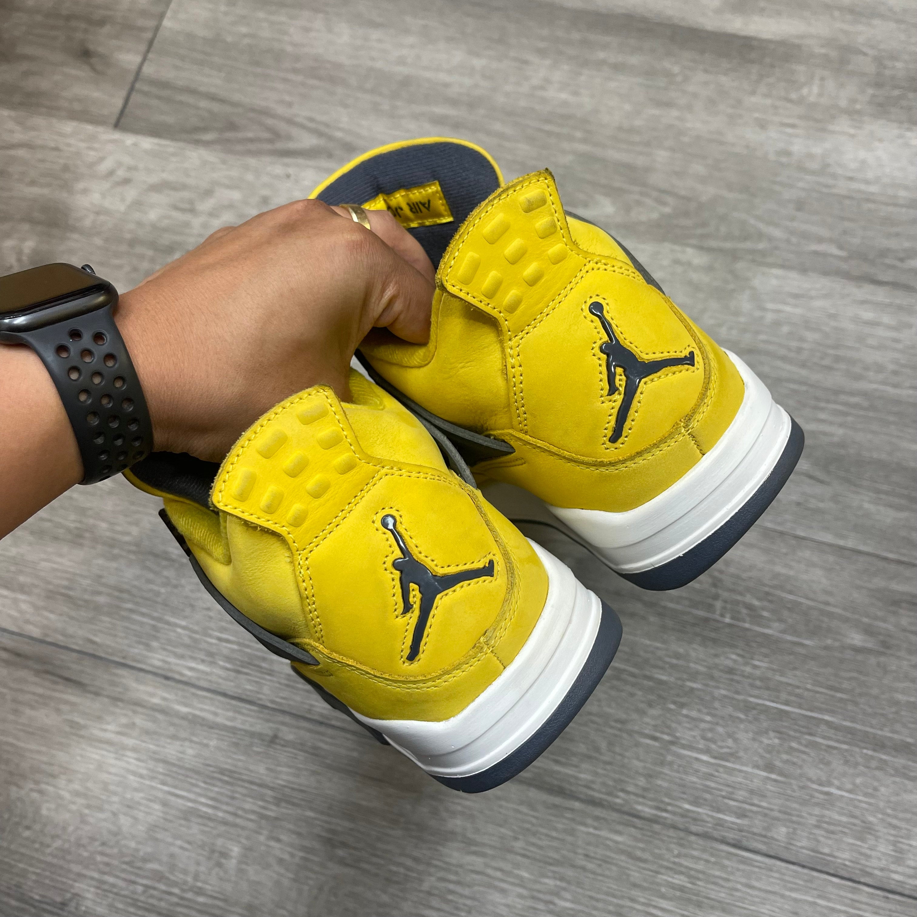 retro 4 lightning on feet